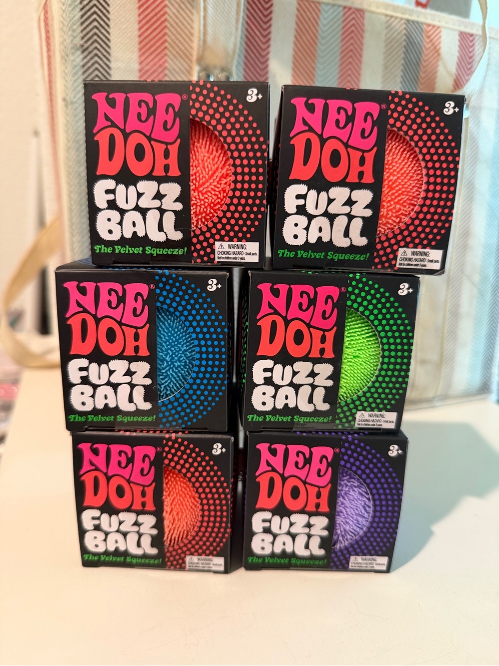 Fuzz Ball Sensory Squeeze Toy - Assorted Colors needoh